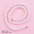 Detail of 50cm white pearl cake topper chain with 8mm beads on pink background - Pearl Chain / 8mm 50cm