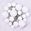 Detailed view of assorted white glitter foam ball cake toppers on green stems for decoration - 20 Pieces Set / Glitter White