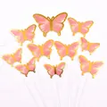 Detail view of pink butterfly cake toppers with elegant gold foil stamping edges - 10 Pieces Set / Pink