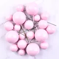 A detailed view of pink foam balls in various sizes for cake toppers and decoration - 20 Pieces Set / Pink