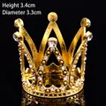 Detailed close-up of small golden alloy crown with sparkling rhinestones for cake decoration - High Rhinestone Gold