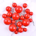 Close-up detail of mixed size glossy red foam balls for birthday cake decoration - 20 Pieces Set / Red
