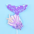 Detailed view of mermaid tail and shell cake topper with dimension labels - Purple