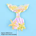 Detailed view of iridescent mermaid tail cake topper with starfish, shell, and dimensions - Yellow