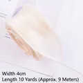 Macro view of 4cm cream wavy edge organza ribbon for floral and gift packaging - 10 Yards (Approx. 9m) / Beige