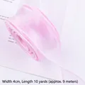 Close-up detail of 4cm pink fishtail organza ribbon for floral and gift packaging - 10 Yards (Approx. 9m) / Light Pink
