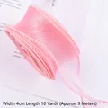 Close-up of 4cm wide pink fishtail gauze ribbon for floral and cake decoration - 10 Yards (Approx. 9m) / Flesh Pink