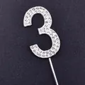 Macro view of silver rhinestone number 3 cake topper for birthday decorations - Number 3 / Silver