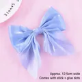 Detail showing 12.5cm iridescent mesh bow topper for cake decoration - Mesh Bow-knot (022) / Blue