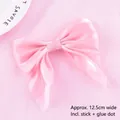 Close-up of elegant pink mesh bow cake decoration topper, 12.5cm width with glue dots - Mesh Bow-knot (022) / Apricot