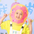 Creative pink donut shaped party face mask prop for kids birthday celebration photoshoot - Donut