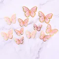Elegant set of 10 pink gold-stamped butterfly cake toppers with flexible wire stems. - Gilded Butterfly Pink