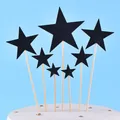 Close-up detail of black glitter star shaped cake toppers with wooden sticks for party decoration - Pentagram / 7-Pack Set / Black