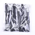 Close-up of black and silver party blowouts in transparent plastic packaging. - 11cm Silver 6 Pieces