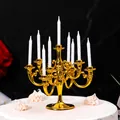 Mini gold retro plastic candelabra cake topper featuring 9 white spiral candles - Electroplated Gold (With Candles)