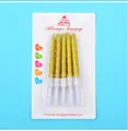 Set aus spiralförmigen goldenen Geburtstagskerzen in einer weißen Blisterverpackung - 6-teiliges Set / Gold