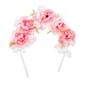 Detailed close-up of a pink rose flower arch cake topper with elegant white ribbon bows - Flower Arch Pink