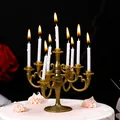 Elegant vintage gold plastic candelabra cake topper featuring nine white spiral candles - Retro Gold (With Candles)