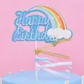 Glittery Happy Birthday cake topper with rainbow cloud design and ribbons for party decor - Blue