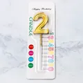 Elegant golden number 2 birthday cake candle presented in professional retail packaging - Number 2