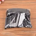 Bulk pack of 100 disposable black plastic forks for desserts and fruits on wood surface. - 100 Pieces Pack / Black
