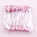 Pack of pink metallic heart cake toppers for birthday dessert and party decoration. - Heart / 50 Pieces / Pink