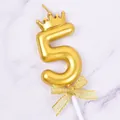 Elegant golden number 5 birthday candle featuring a mini crown and mesh bow tie - Crown Number 5