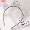 Detail of silver glitter cat ear headband with a mini crown for party birthday celebrations. - Headband Style / Silver