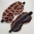 Plush leopard print sleep mask with comfortable satin lining and elastic strap - Dark Leopard Print