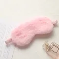 Soft pink plush faux fur sleep mask designed for comfortable rest and light blocking - Pink