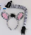 Detailed macro view of plush zebra ear headband and matching striped tail costume accessory - Zebra Two-Piece Set