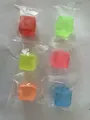 Detailed view of colorful maltose ice cube squishy toys in individual clear plastic bags - Frosted Random / Size 3.0