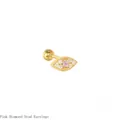 Close-up macro detail of golden evil eye cartilage stud with pink diamond center - Pink Rhinestone (Gold Tone)