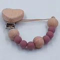 Silicone bead and beech wood heart pacifier clip in dusty pink and natural wood - Dark Mauve
