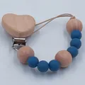 Handmade pacifier clip with blue silicone beads and a heart-shaped beech wood clip - Dark Blue