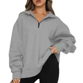 Close-up view of a gray half-zip long sleeve pullover sweatshirt worn by a model - S / Tops / Light Gray