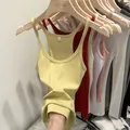 Stylish slim fit ribbed knit camisole tank top for women in a vibrant yellow color - Light Yellow