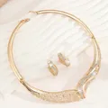 Elegant gold-tone jewelry set featuring shimmering rhinestones, statement necklace and earrings - Wave Grid 2-Piece Set (02) / Gold