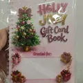 Holly jolly Christmas gift card book with festive tree and gift box design - Pink Christmas Tree