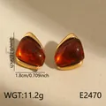 Boucles d'oreilles vintage en acier inoxydable avec résine ambrée et cadre doré. - Clous Triangle Ambre (BJGE2470)