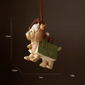 Gedetailleerd hars honden kerstornament met 24 XMAS bordje en een bruin lintje - Kalender Hond