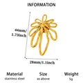 Close-up detail of the golden stainless steel abstract flower brooch with size info - Art Sunflower Style (XZ452)
