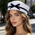 Elegant white navy sailor hat for women featuring a stylish black velvet bow detail - Black Bow / White