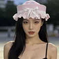 Elegant pink sailor hat for women featuring delicate lace trim and a white bow - Pink Hat with White Bow