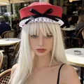 Fashionable red and white sailor hat with a black bow and ruffled trim for women - Red and White Color Block Bow Sailor Hat