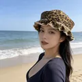 Stylish women's leopard print bucket hat with bow detail and trendy frayed edge - Leopard Captain Navy Hat Style / Leopard Print