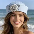 Light blue sailor hat for women with silver floral decor, stylish navy cap for summer beach wear. - Blue Flower
