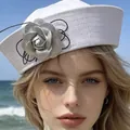 Stylish white sailor hat for women featuring a textured silver camellia flower ornament - White Flower