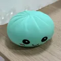 Cute mint green bun-shaped squishy toy with a funny face for stress relief play - Smiley Face / OPP Bag / Green