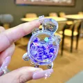 Close-up of a transparent acrylic turtle ornament filled with purple liquid sand beads - Luminous Bubble Bead Turtle (Without Buckle) / 1 Piece (Without Keychain) / Purple